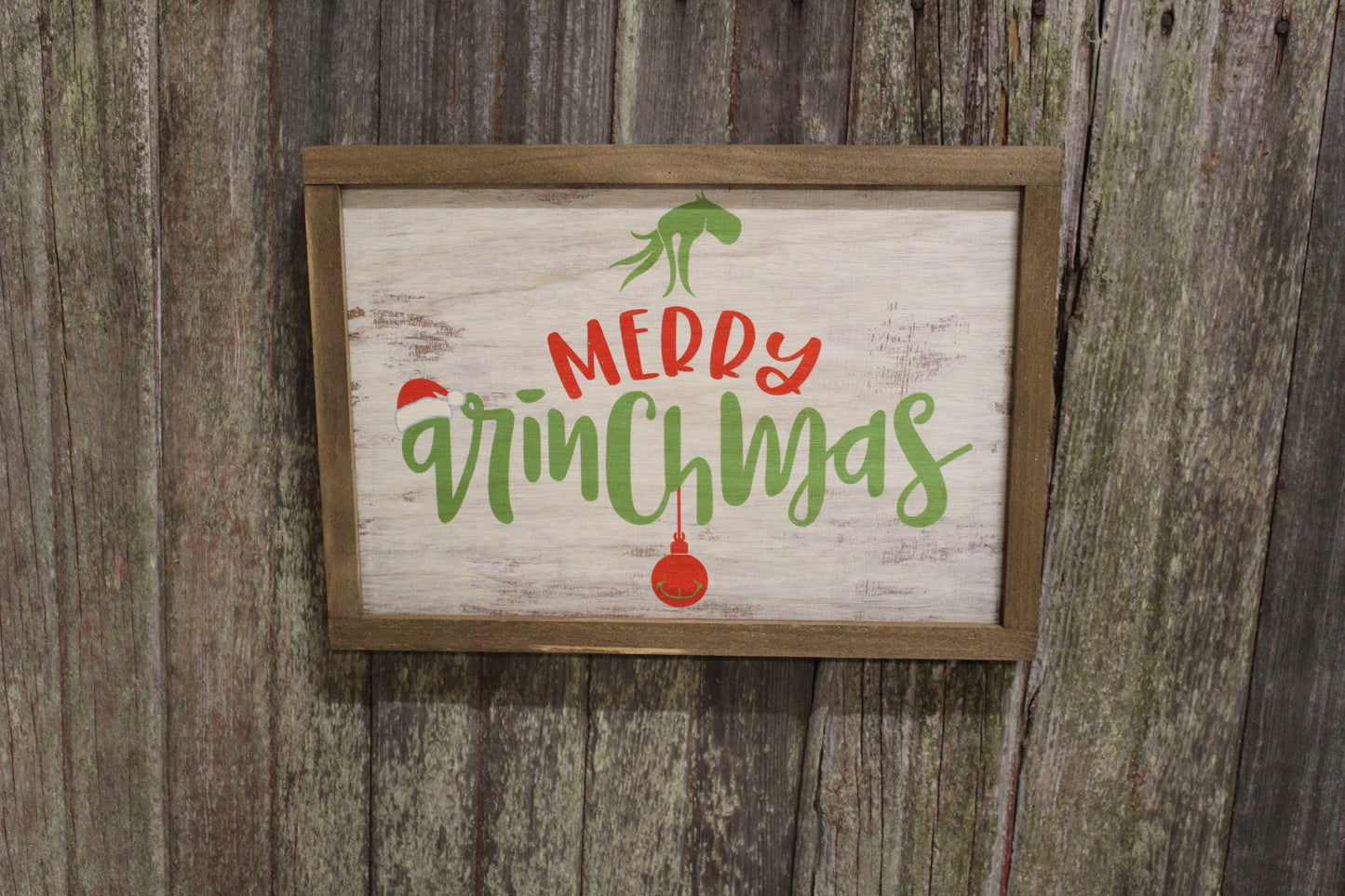Merry Grinchmas Grinch hand holding ornament Christmas sign rustic white washed wood brown frame made in the USA