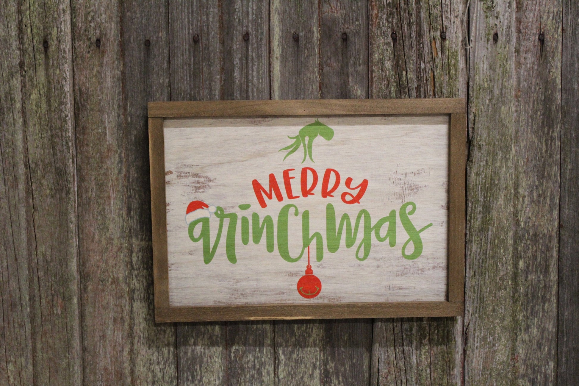 Merry Grinchmas Grinch hand holding ornament Christmas sign rustic white washed wood brown frame made in the USA