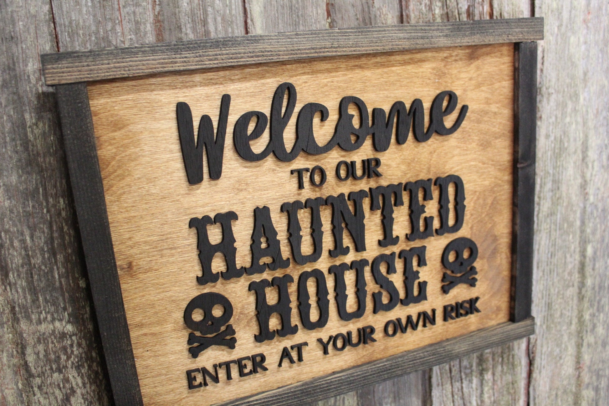 Welcome to Our Haunted House Sign Skull Crossbones Enter at Your Own Risk Halloween Scary 3D Raised Text Country Farmhouse Cabin Wood Decor