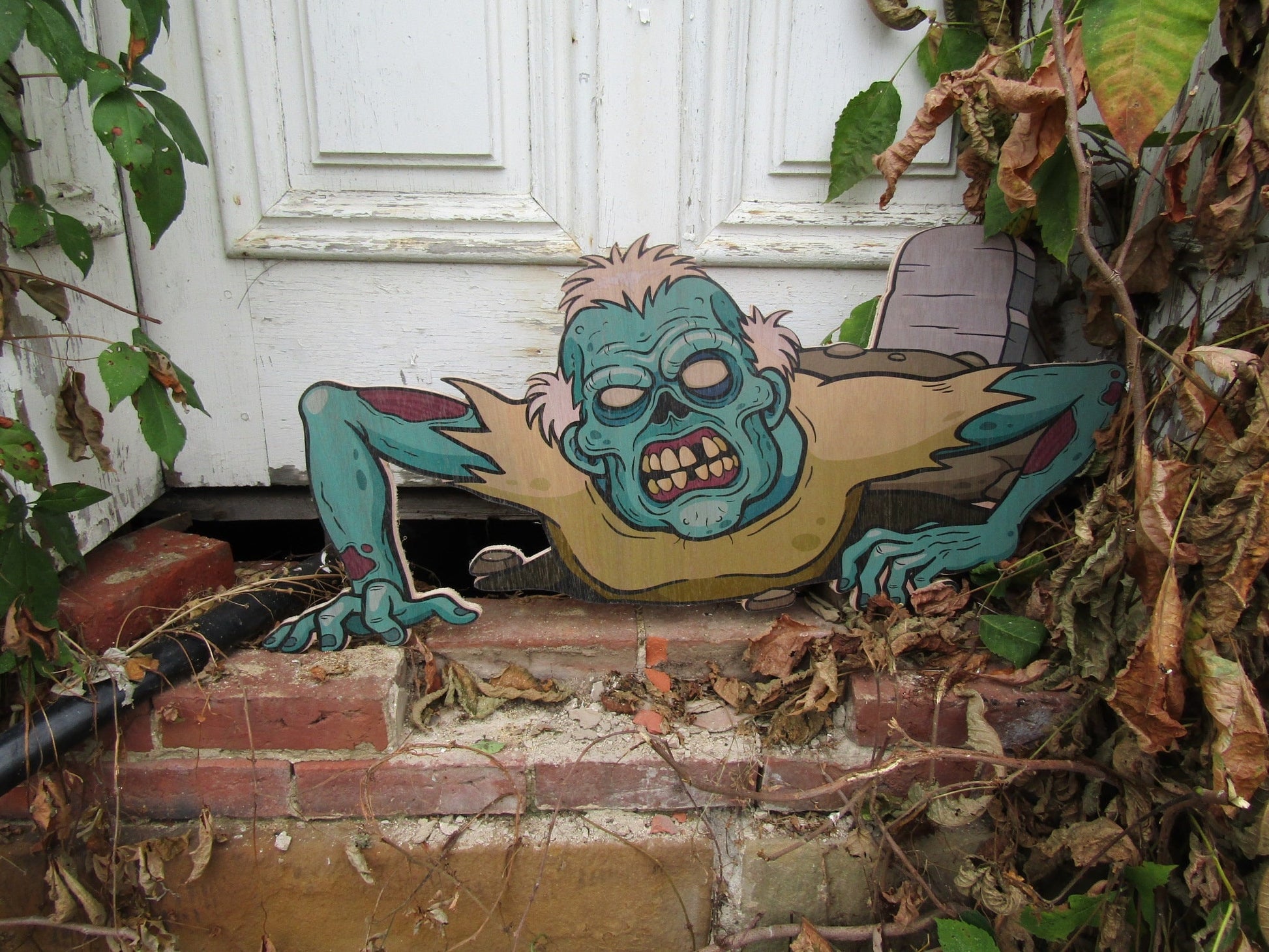 Zombie crawling from the ground scary happy Halloween yard decor great for trick or treat wood sign