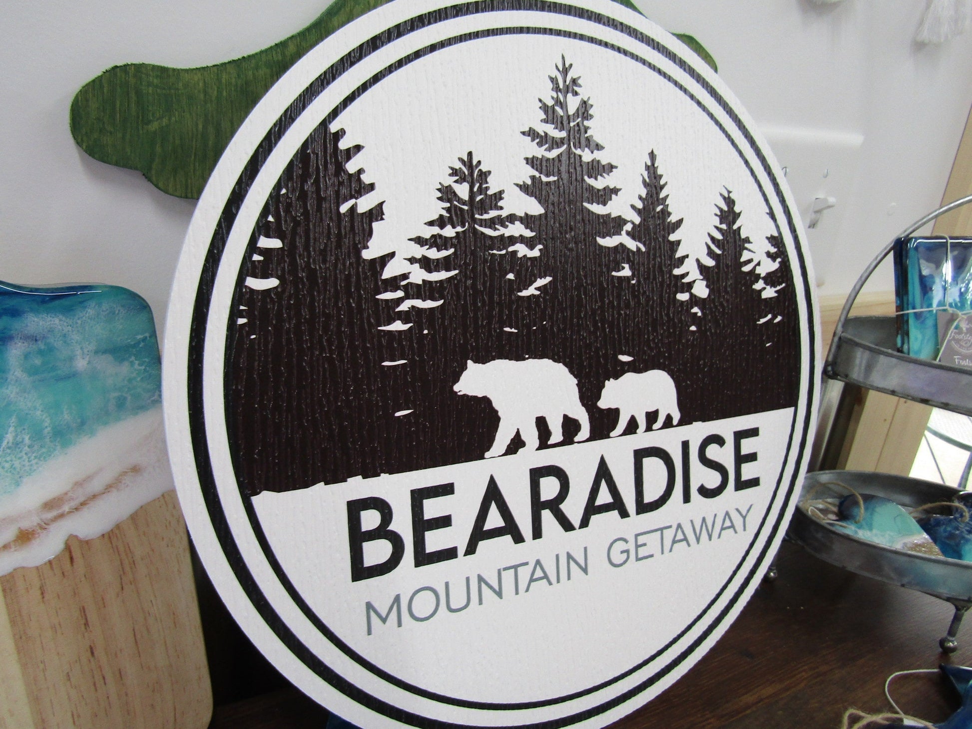 Bear's Paradise Mountain Getaway PVC sign with custom cabin pine trees wilderness bears textured PVC, weather fade resistant, waterproof UV printed color logo business commercial signage.