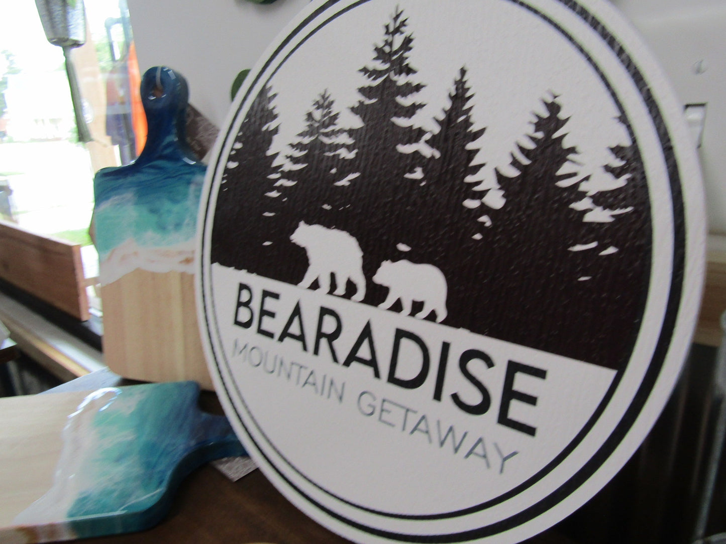 Bear's Paradise Mountain Getaway PVC sign with custom cabin pine trees wilderness bears textured PVC, weather fade resistant, waterproof UV printed color logo business commercial signage.