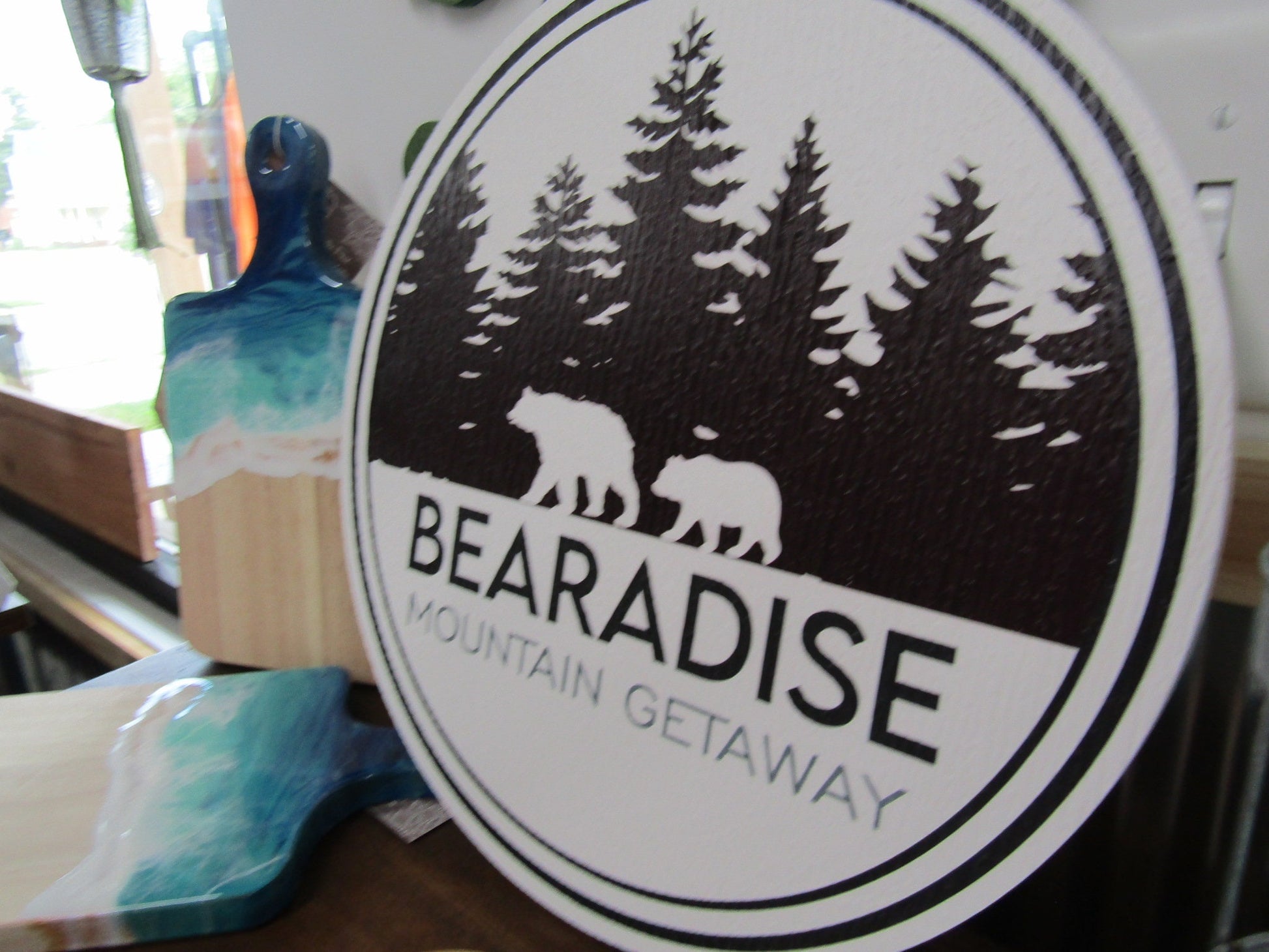 Bear's Paradise Mountain Getaway PVC sign with custom cabin pine trees wilderness bears textured PVC, weather fade resistant, waterproof UV printed color logo business commercial signage.