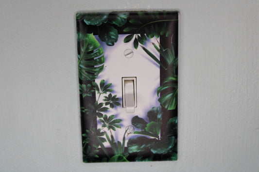 deep green forest jungle houseplants palm monstera leaves plants light switch plate cover printed durable green decor unique custom piece