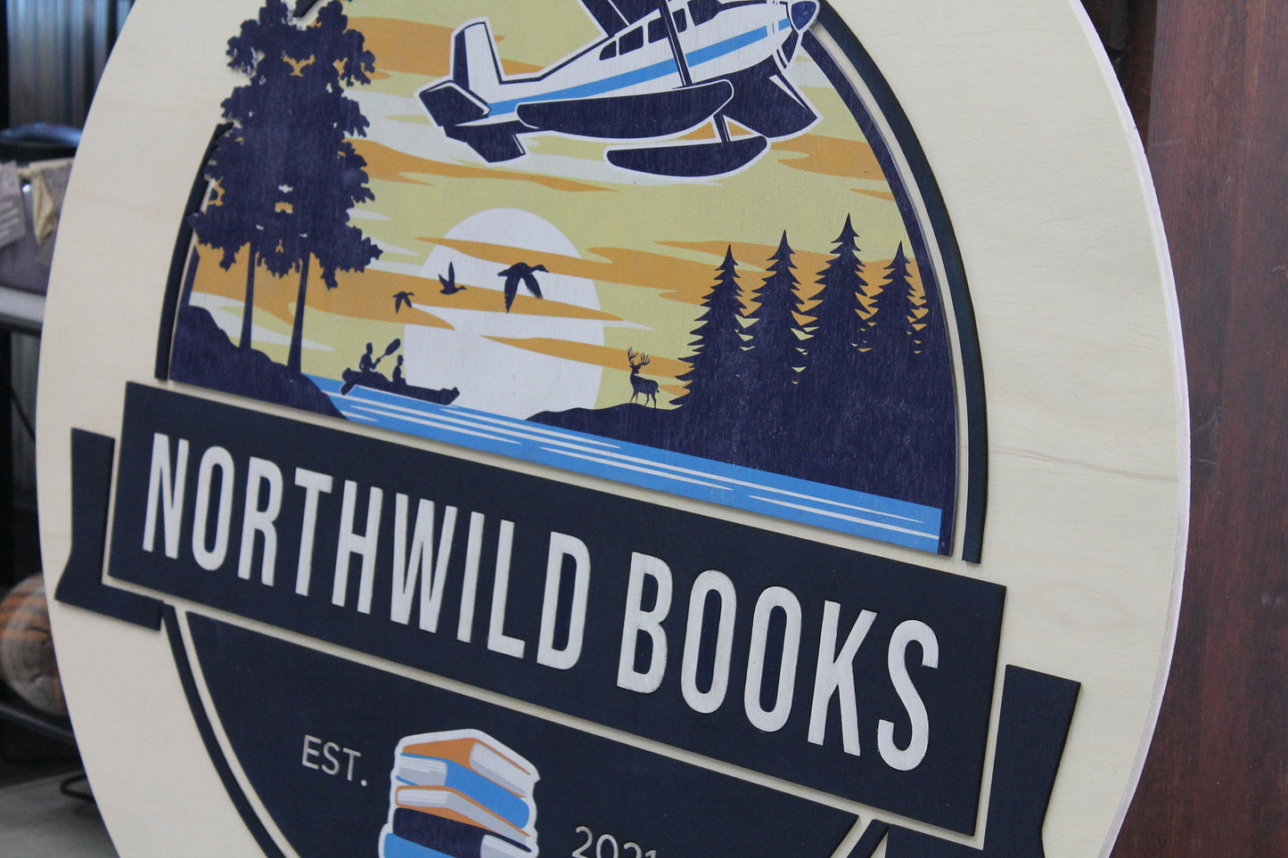 Book Store Small Business Logo Custom Round Sign Printed In Color Raised Lettering Sunset Airplane Commerical Store Front Signage