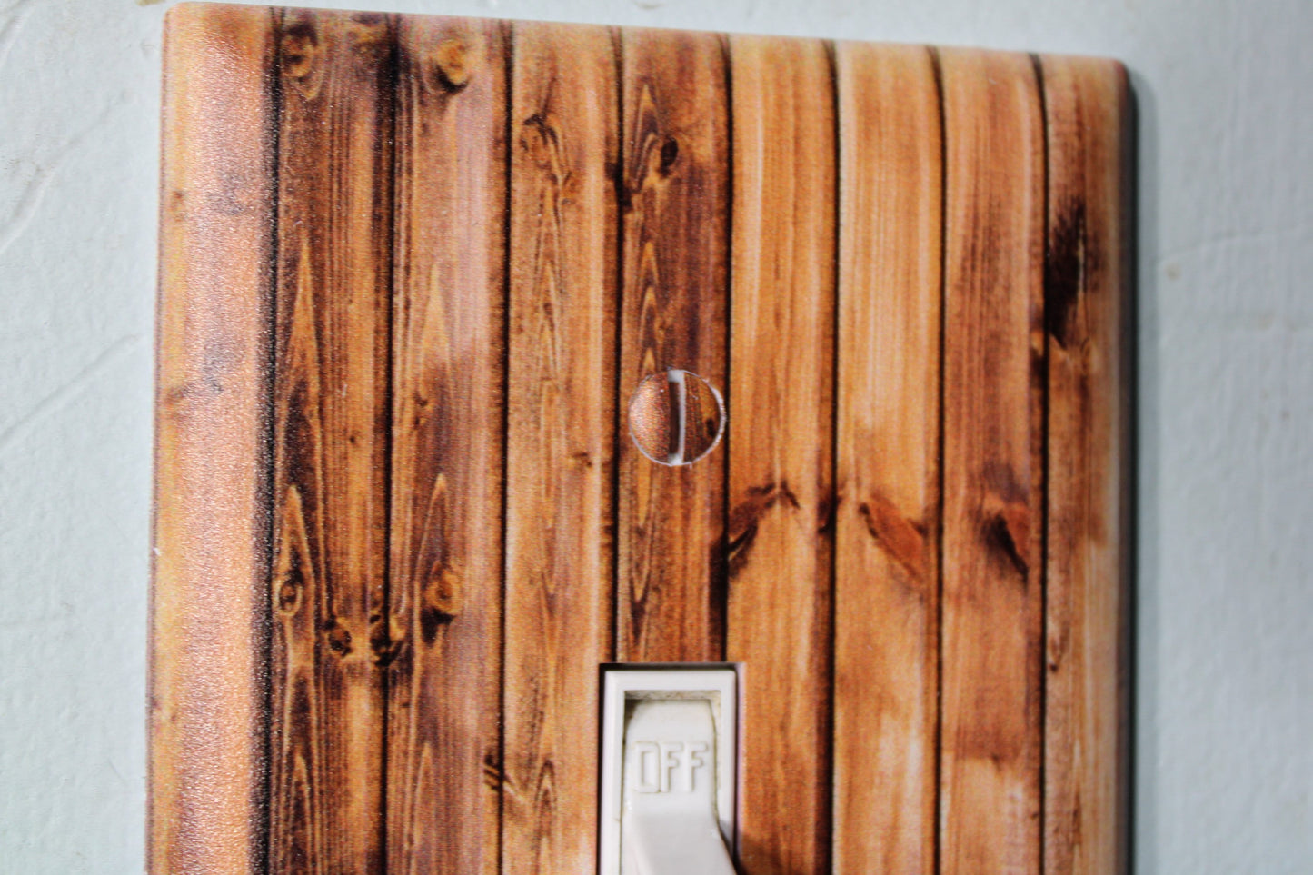 knotty pine pallet wood barnwood with warn painted paint chips light switch cover plate farmhouse decor rustic cedar
