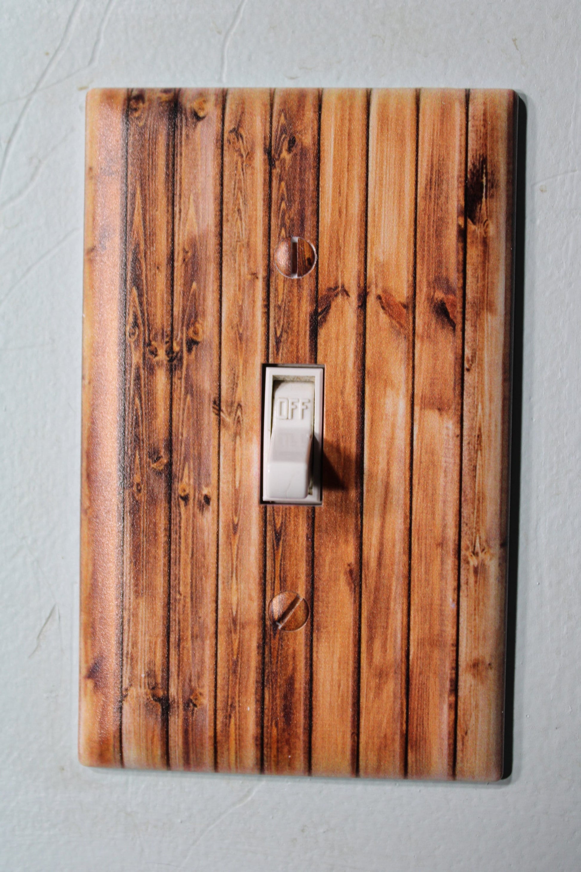 knotty pine pallet wood barnwood with warn painted paint chips light switch cover plate farmhouse decor rustic cedar