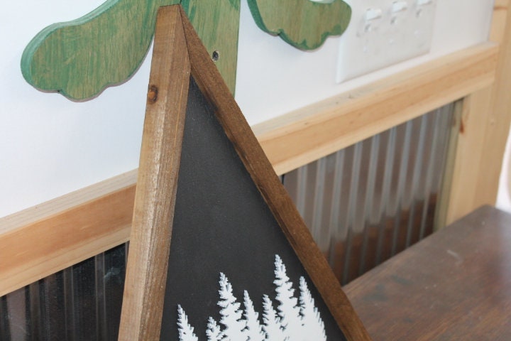 raised tree sign