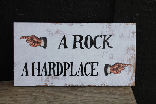 A Rock A Hard place Hands Arrows Textured PVC UV Printed Outdoor Weather Proof Rustic Funny Play On Words Sign Rectangle Signage