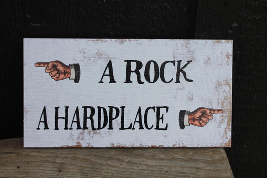 A Rock A Hard place Hands Arrows Textured PVC UV Printed Outdoor Weather Proof Rustic Funny Play On Words Sign Rectangle Signage
