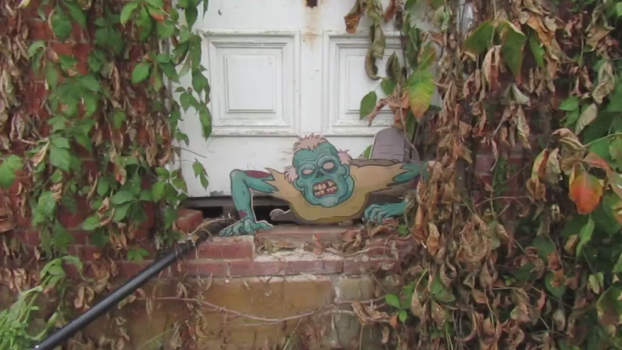 Zombie crawling from the ground scary happy Halloween yard decor great for trick or treat wood sign